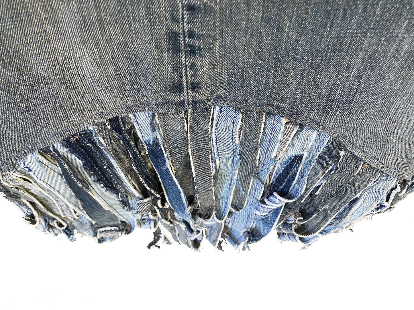 Upcycled Denim Babydoll Tank with raw deconstructed edges and fringe
